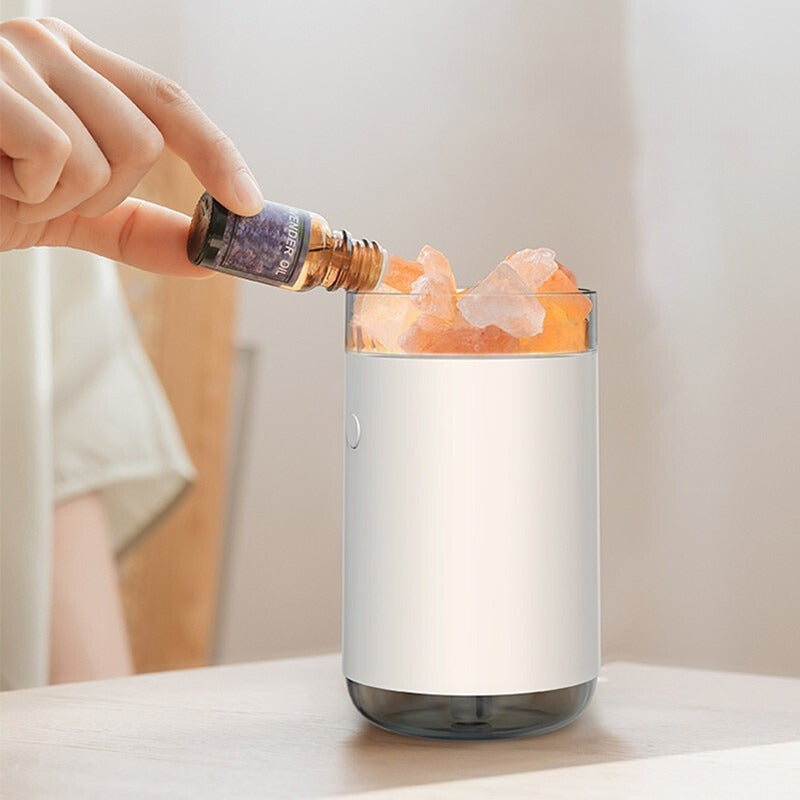 Close-up of Crystal Salt Mine Humidifier with essential oil bottle